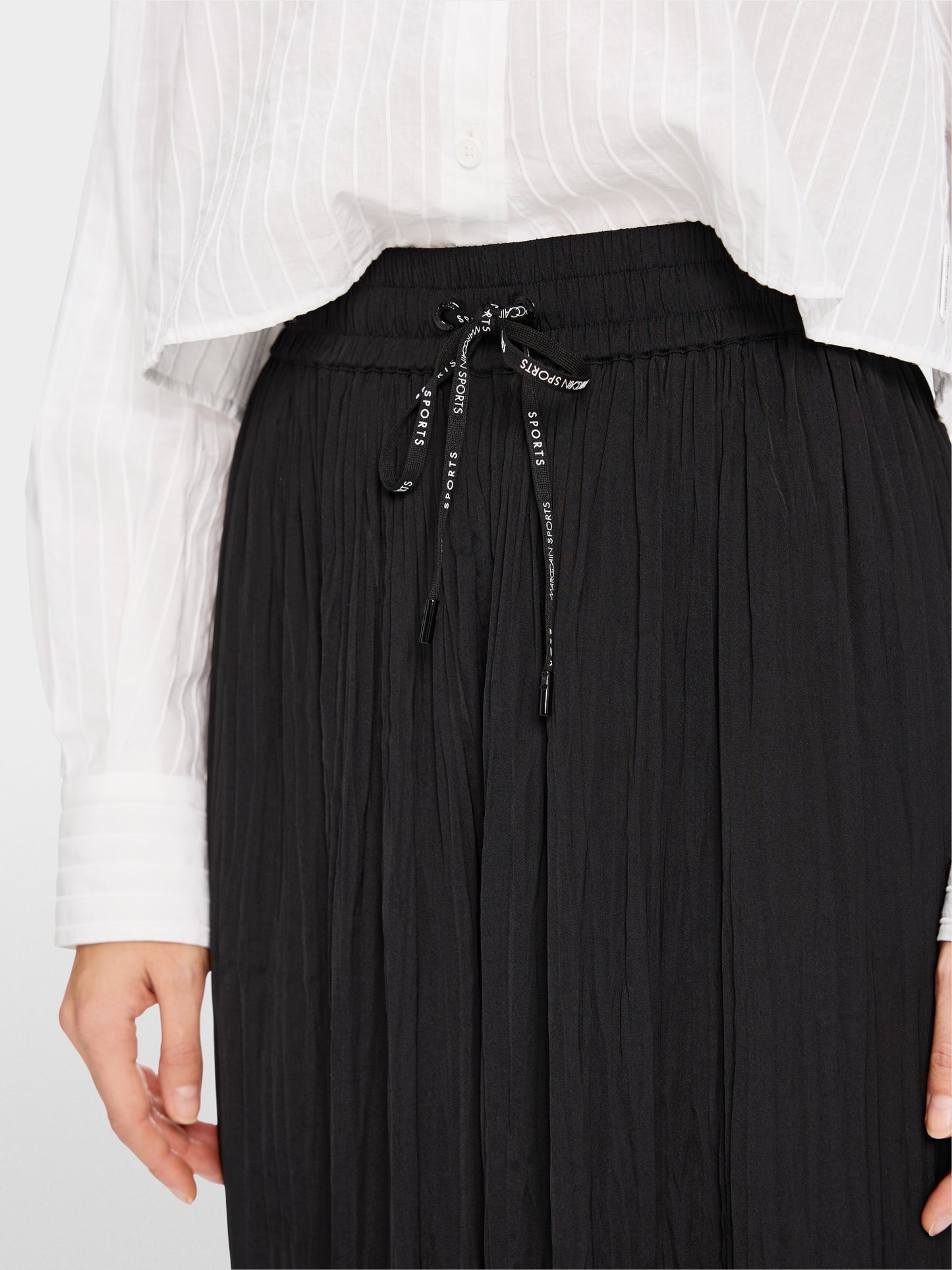 WOLIN Rethink Together pleated trouers