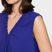 Vibrant top with pleating
