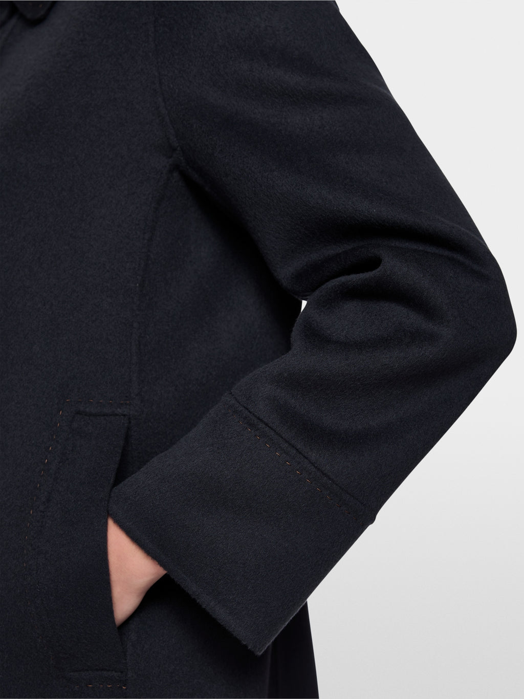 Wool coat with decorative stitching