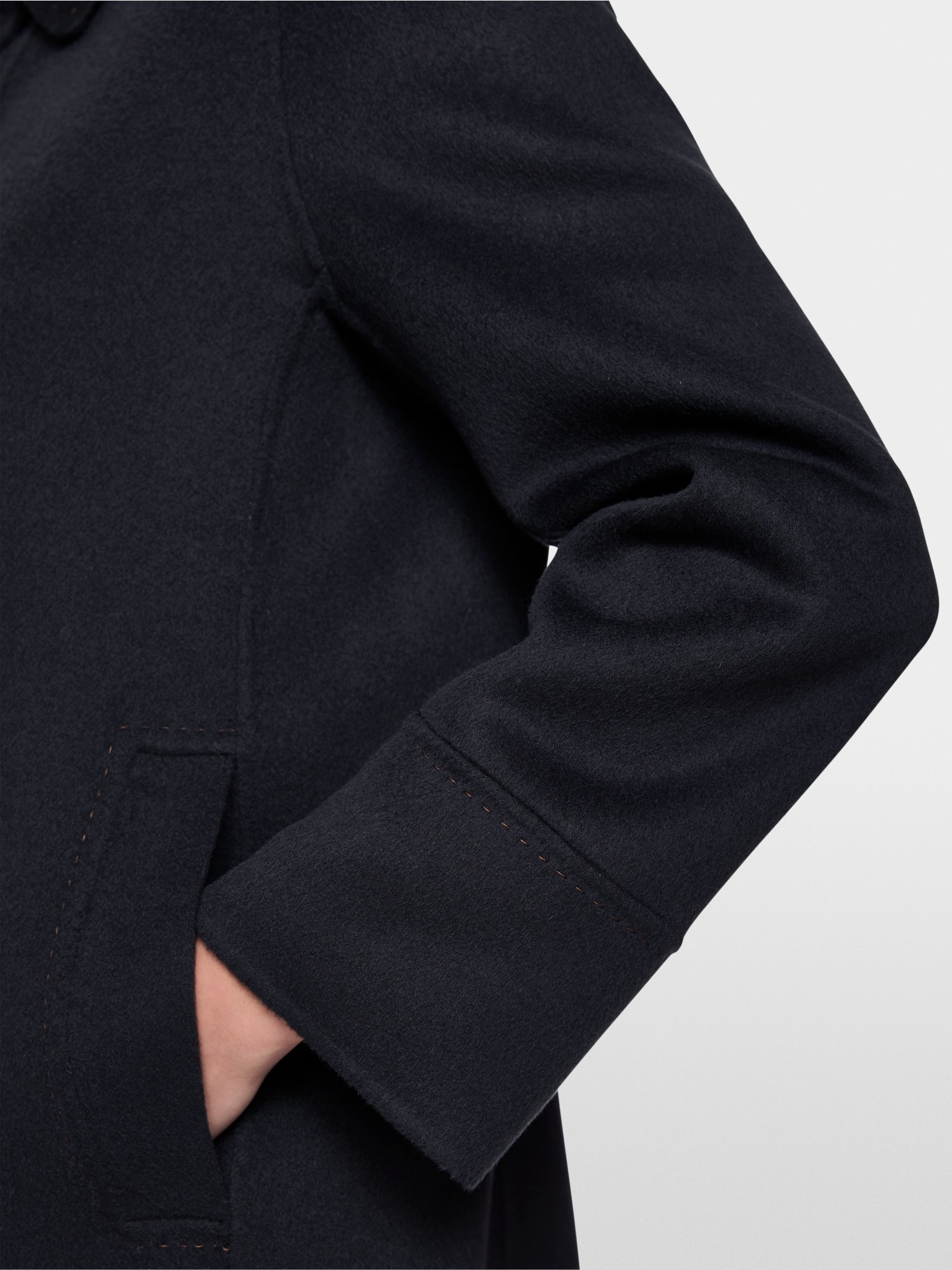 Wool coat with decorative stitching