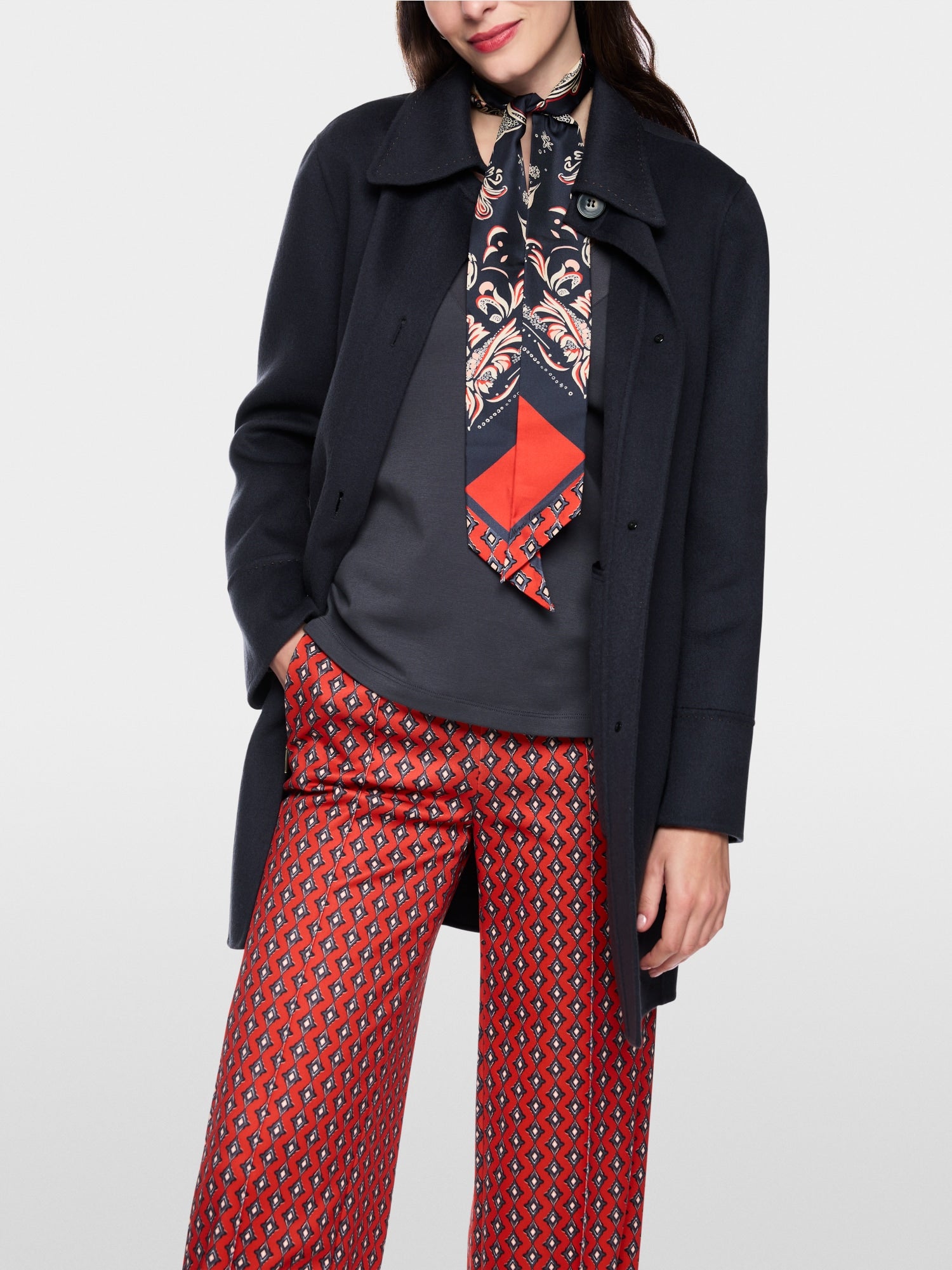 Wool coat with decorative stitching