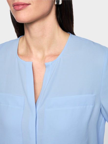 Casual blouse with concealed buttoning
