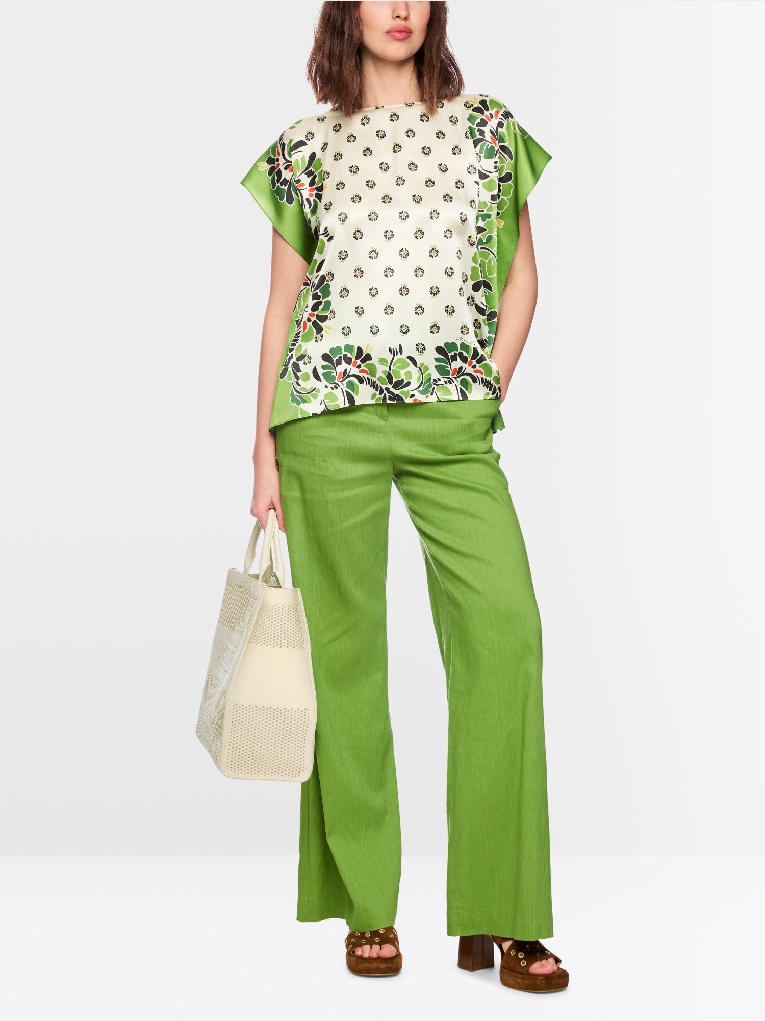 Blouse-style top with hibiscus print