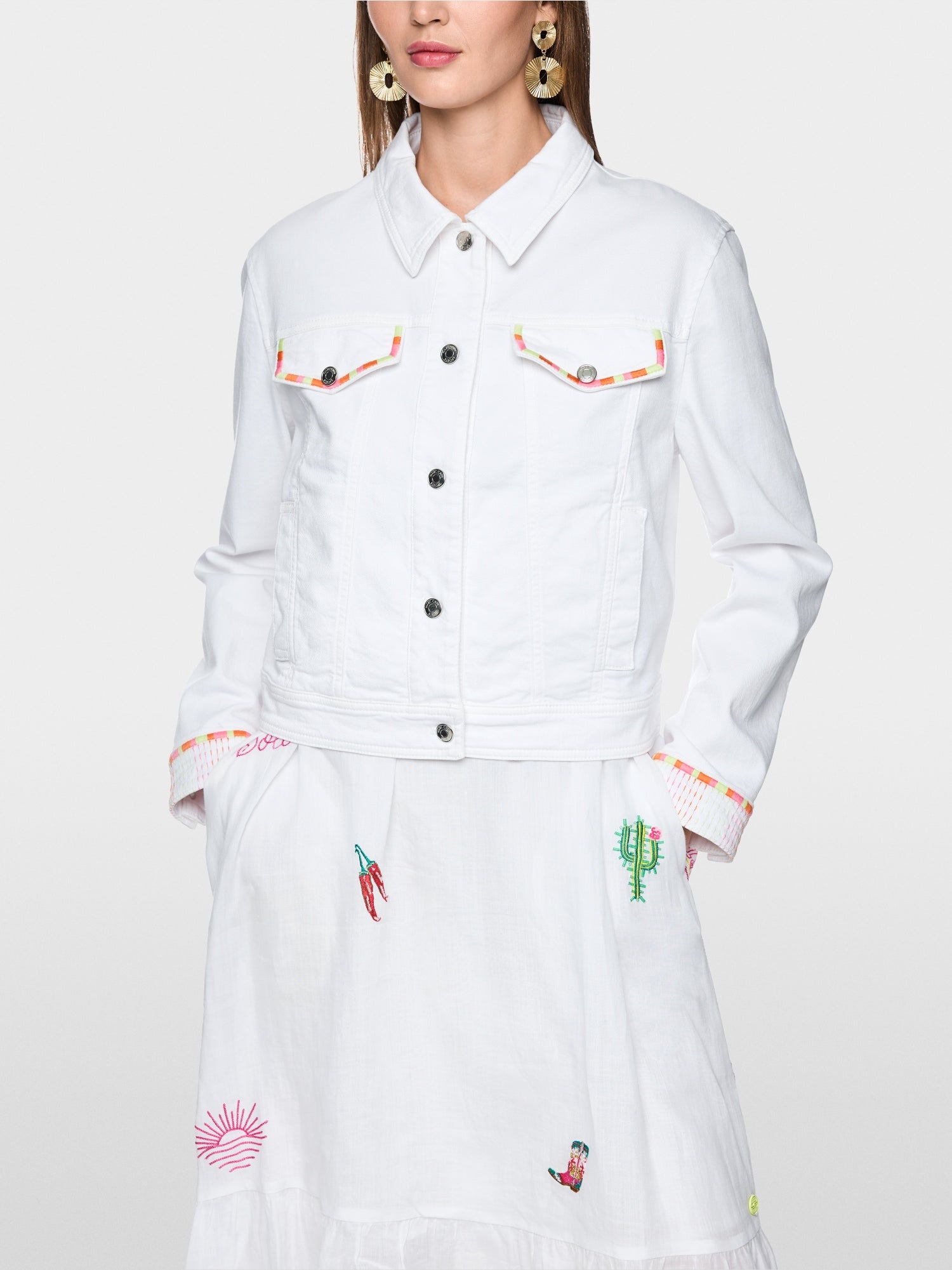 Denim jacket with colourful embroidery