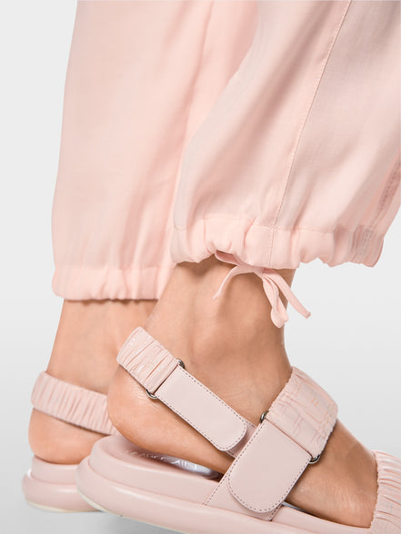 REWARI jogging-style trousers