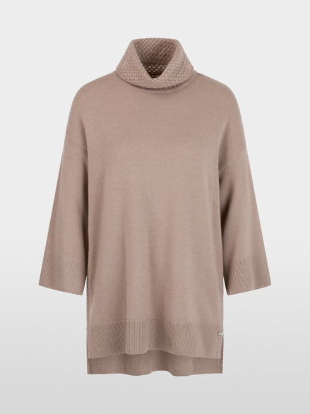 ‘Knitted in Germany’ turtle neck jumper