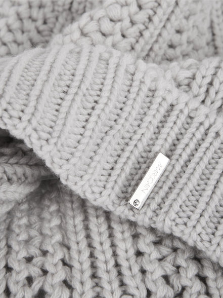 ‘Knitted in Germany’ pom-pom hat