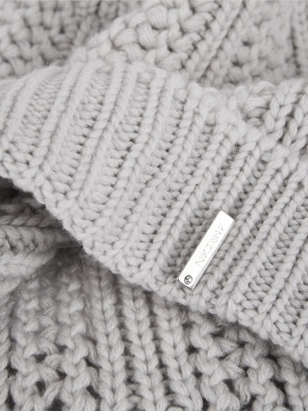 ‘Knitted in Germany’ pom-pom hat
