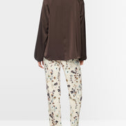 Flared jacket in shiny material