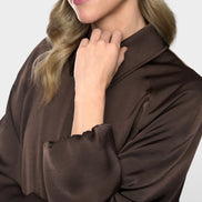 Flared jacket in shiny material