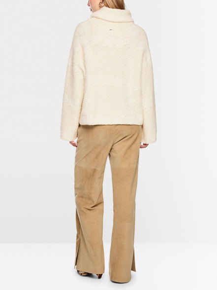 ‘Knitted in Germany’ turtleneck jumper