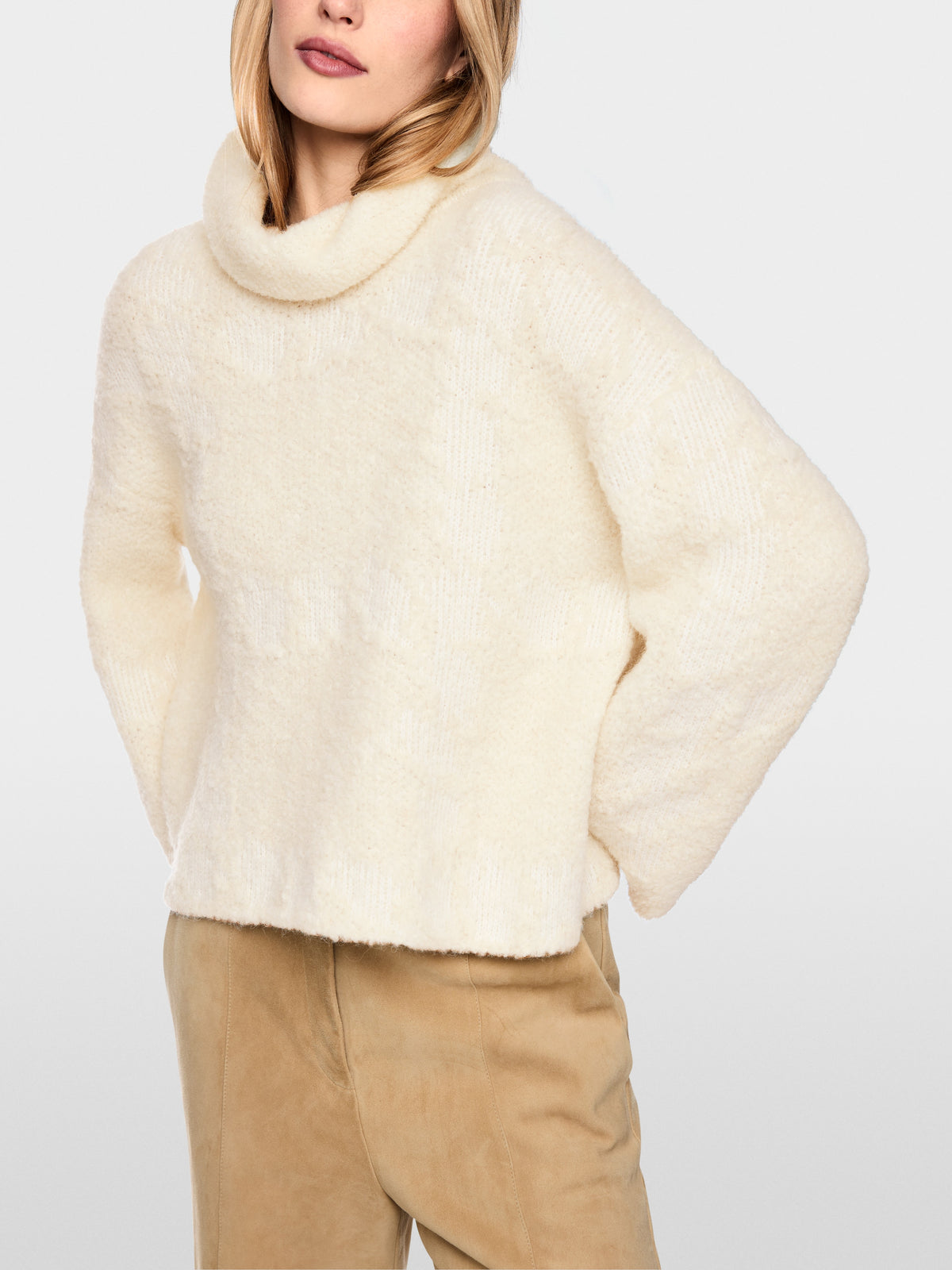 ‘Knitted in Germany’ turtleneck jumper