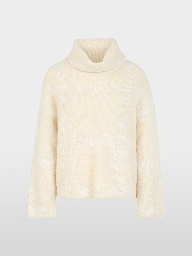 ‘Knitted in Germany’ turtleneck jumper