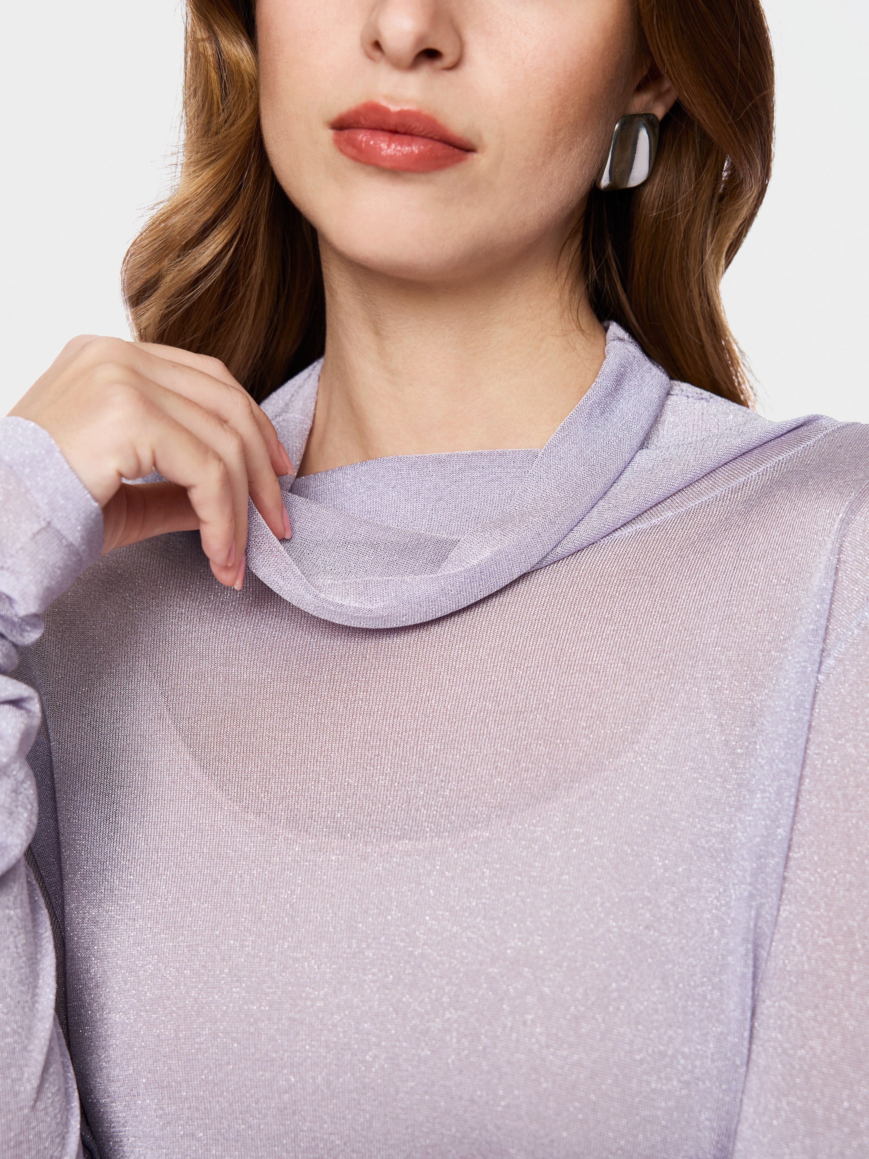 Turtleneck top with sheen and ruffles