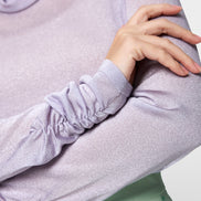 Turtleneck top with sheen and ruffles