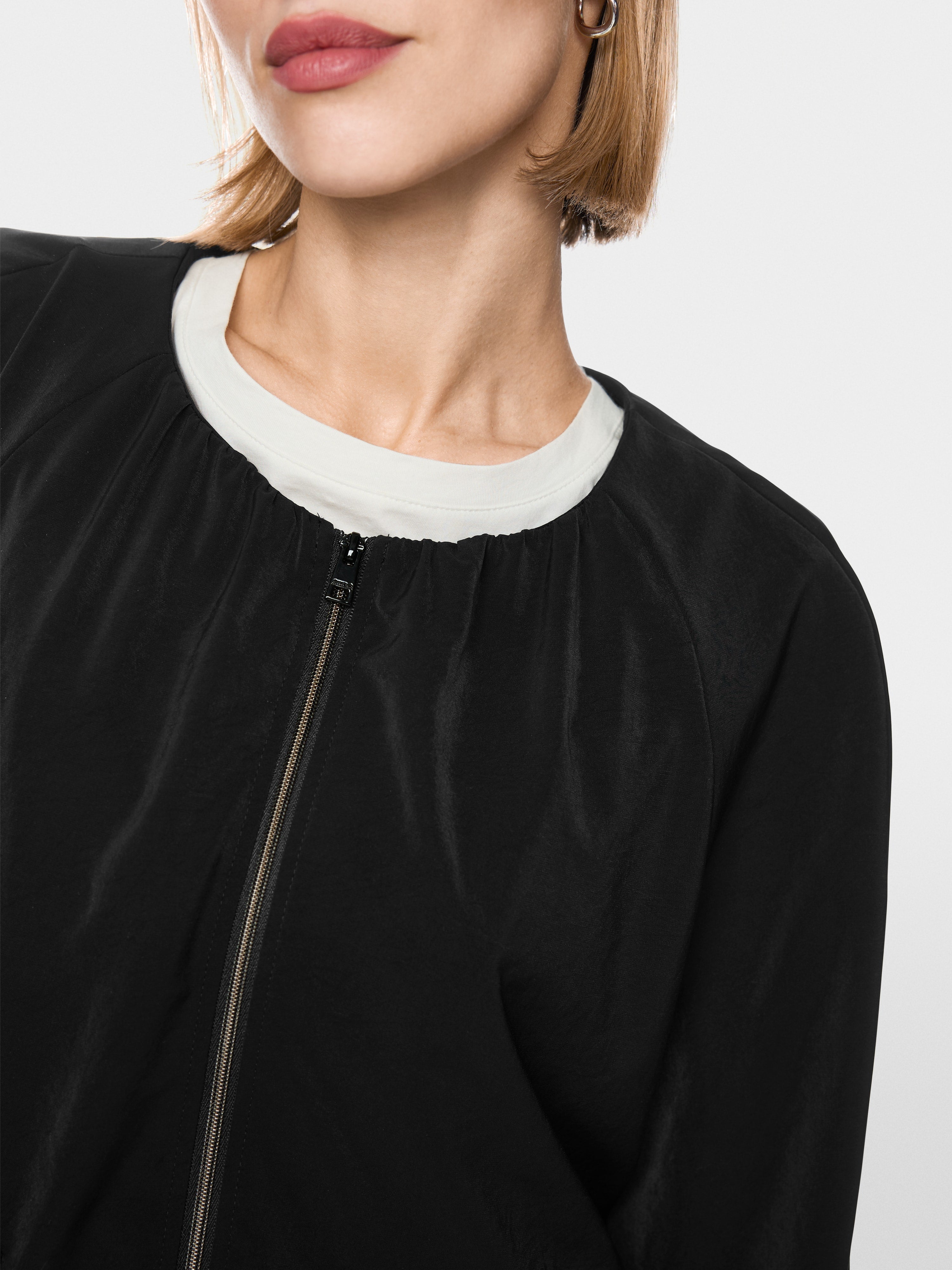 Feminine blouson jacket with gathers
