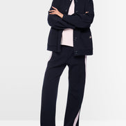Jacket with knitted details