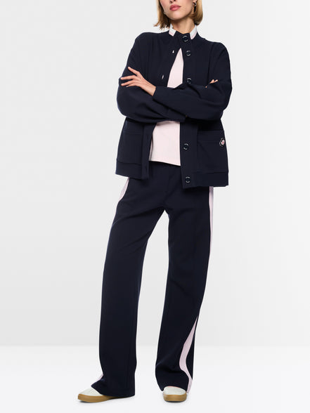 Jacket with knitted details