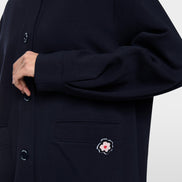 Jacket with knitted details