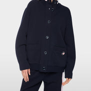 Jacket with knitted details