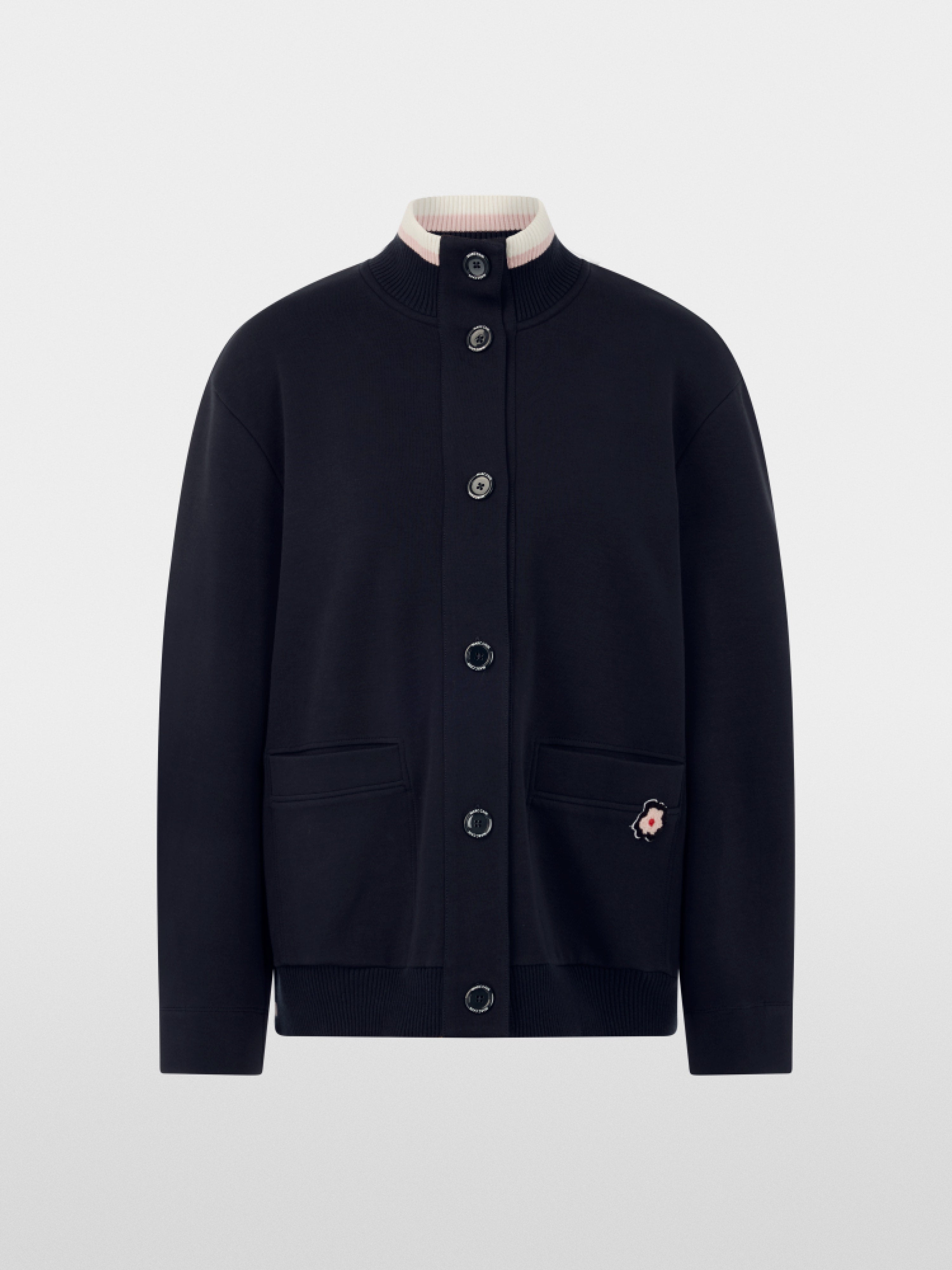 Jacket with knitted details