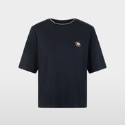 Short-sleeved shirt with floral patch