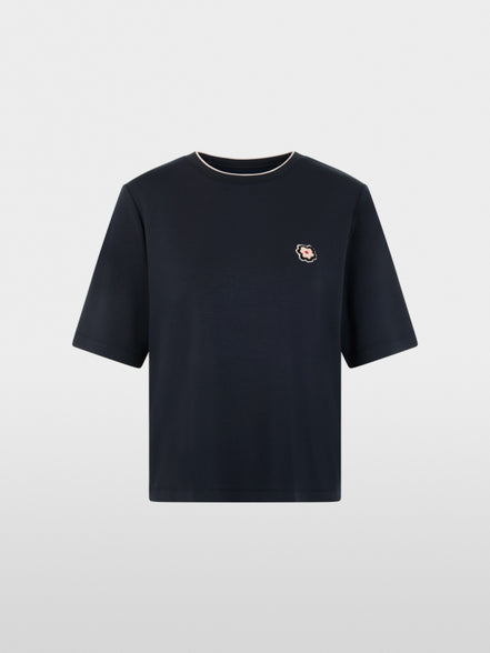 Short-sleeved shirt with floral patch