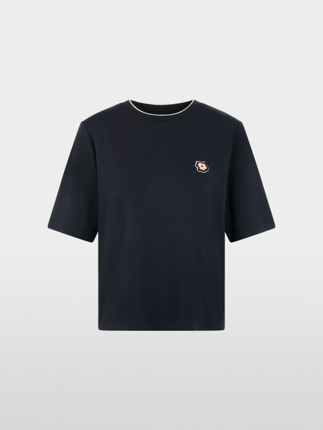 Short-sleeved shirt with floral patch