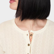 Long-sleeved buttoned openwork top