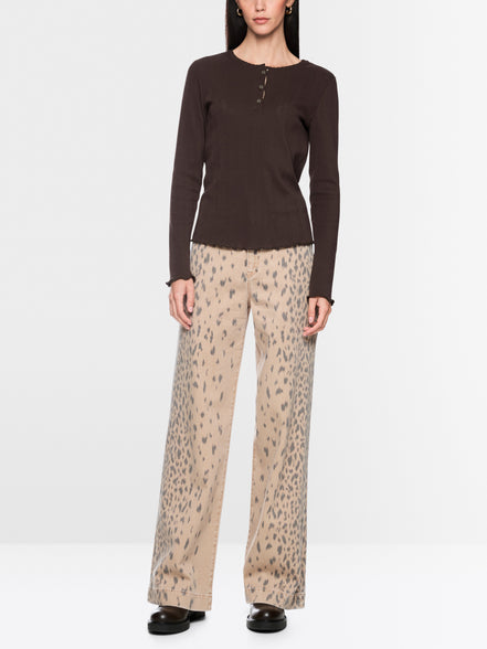 Long-sleeved buttoned openwork top