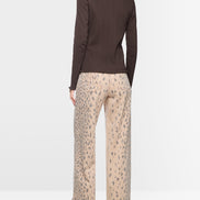 Long-sleeved buttoned openwork top