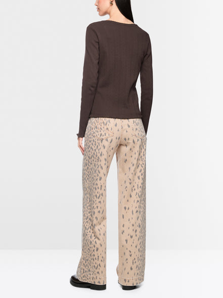Long-sleeved buttoned openwork top