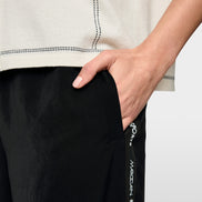 WELKOM pull-on logo stripe trousers