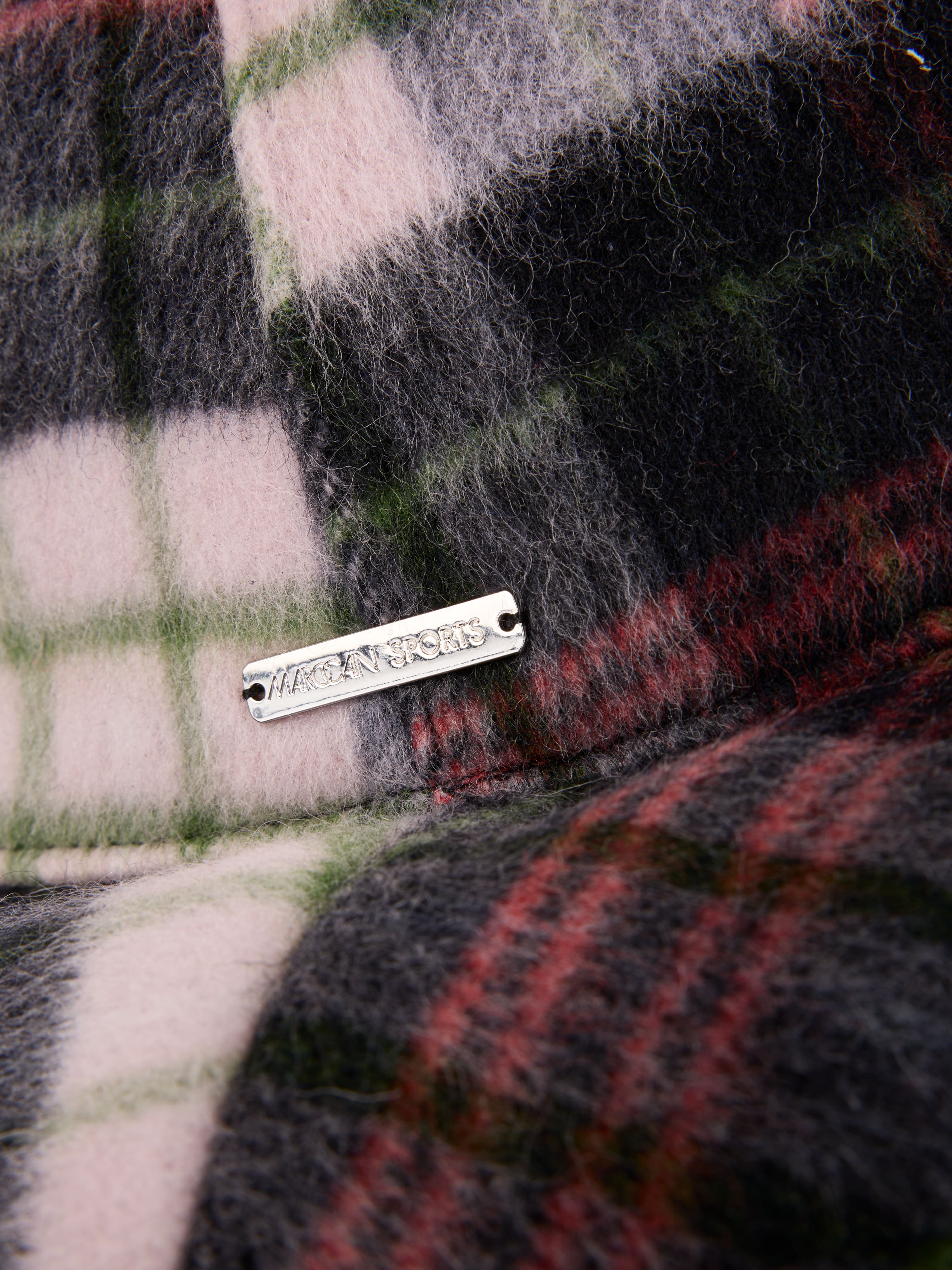 Reversible hat with checked pattern