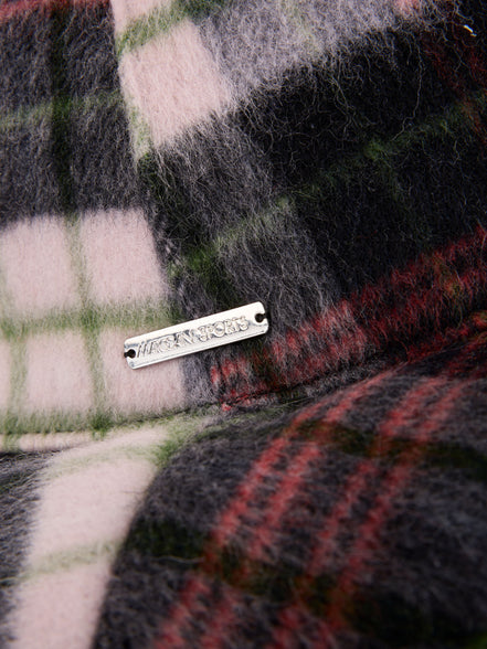 Reversible hat with checked pattern
