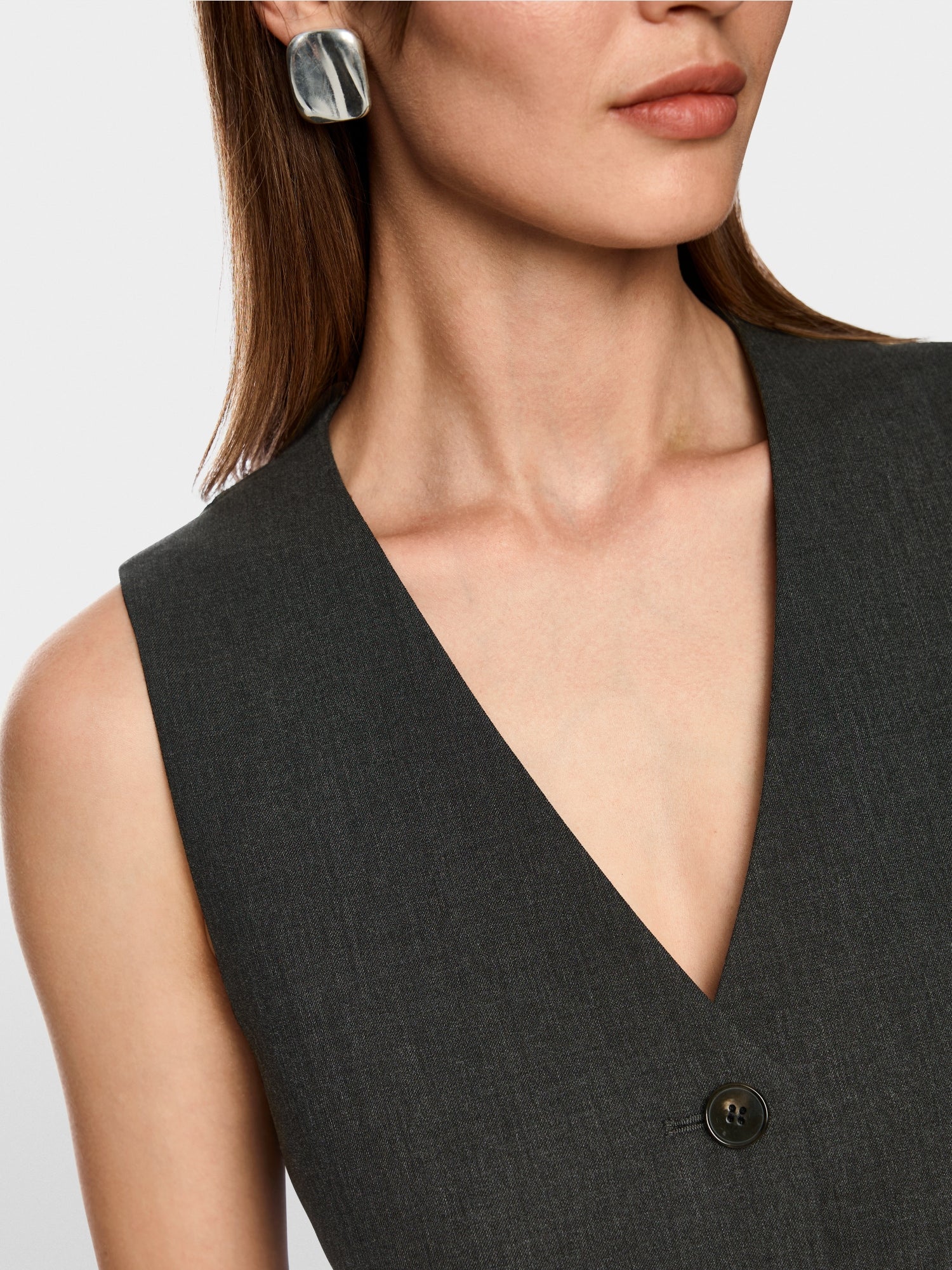 Fitted waistcoat with small belt