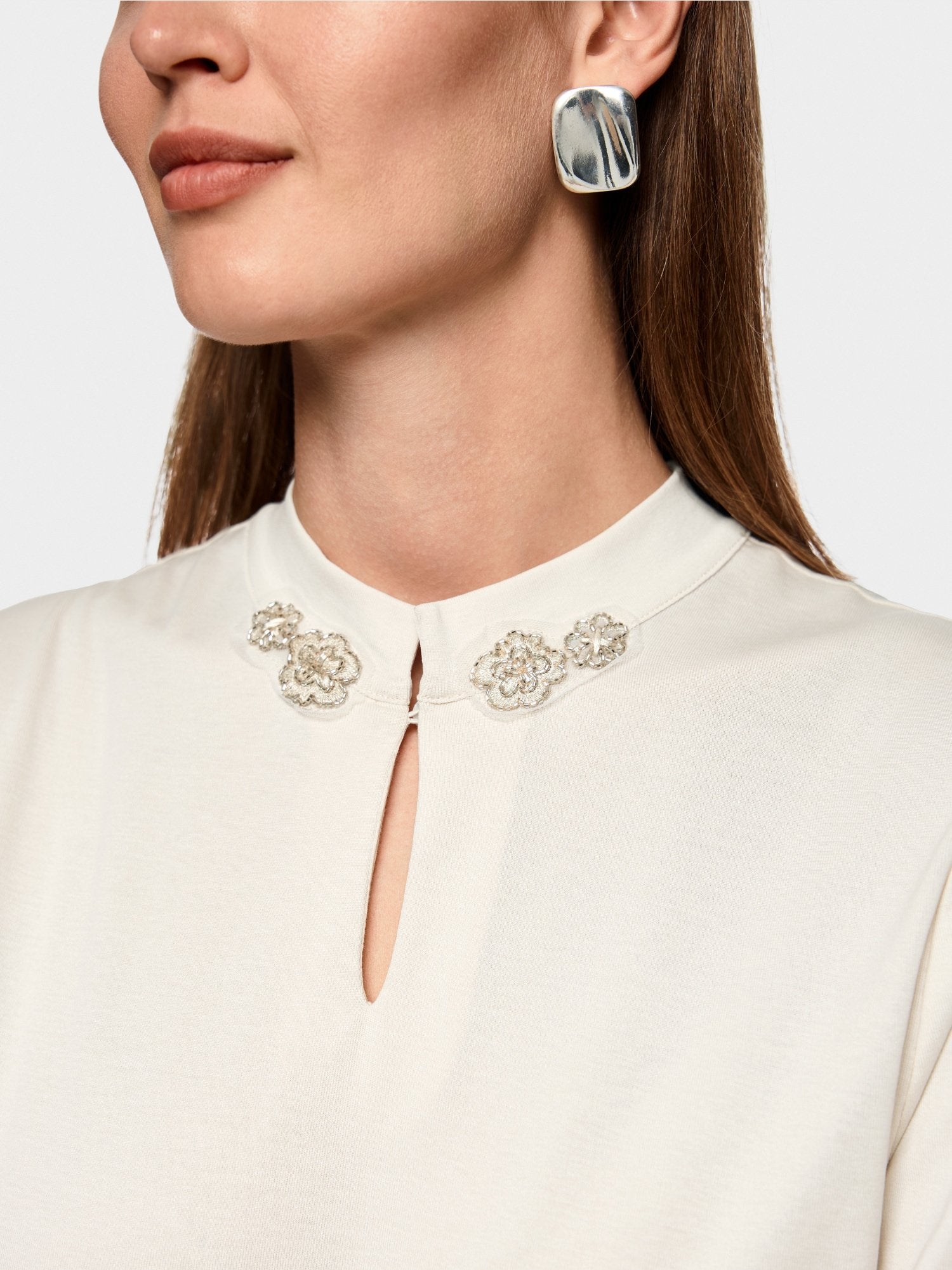 Shirt with sparkling flowers