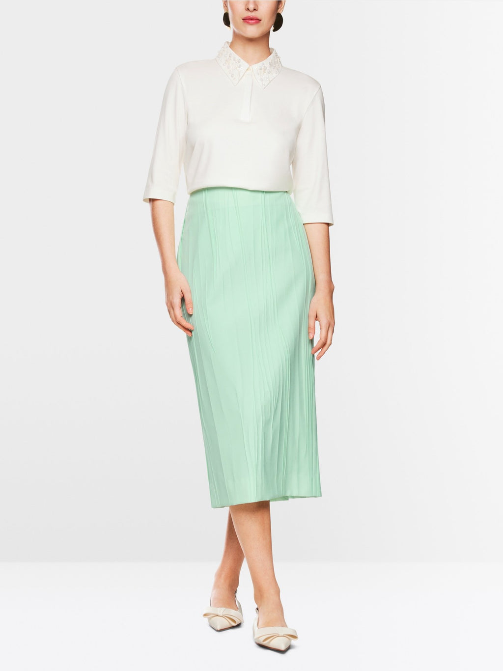 Polo shirt with decorative pearls