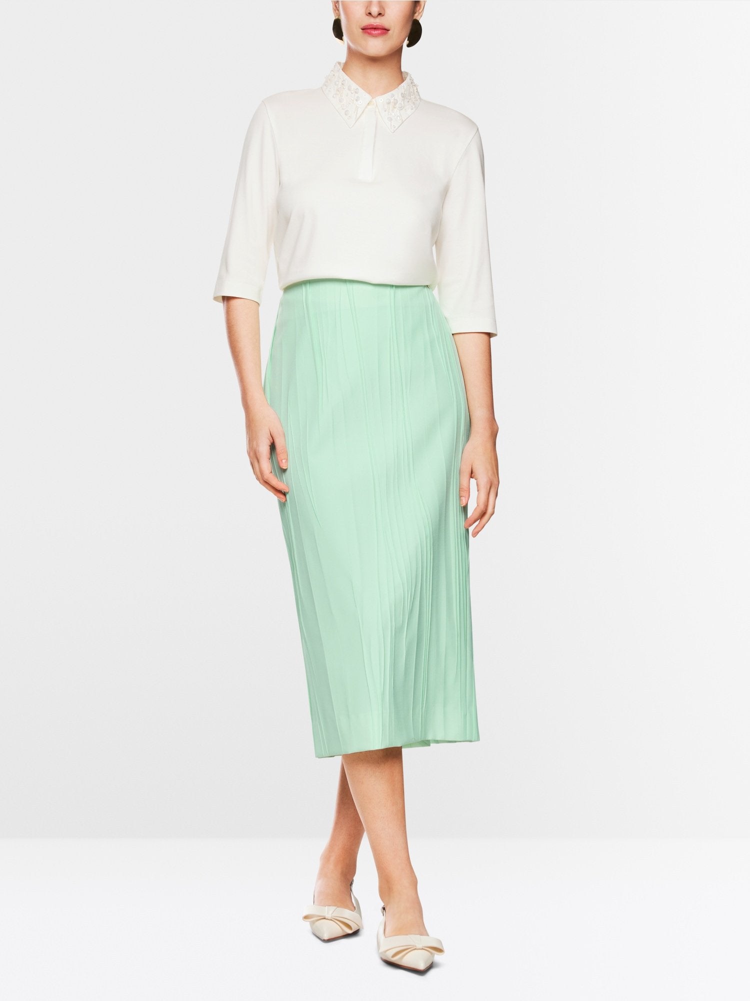 Polo shirt with decorative pearls