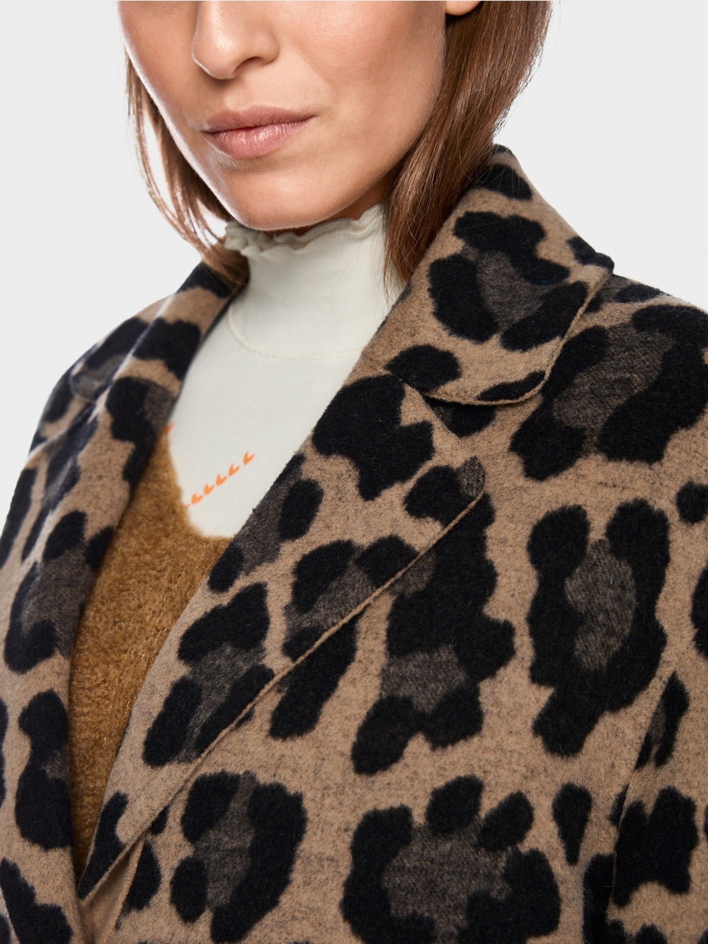 Reversible coat with leopard print