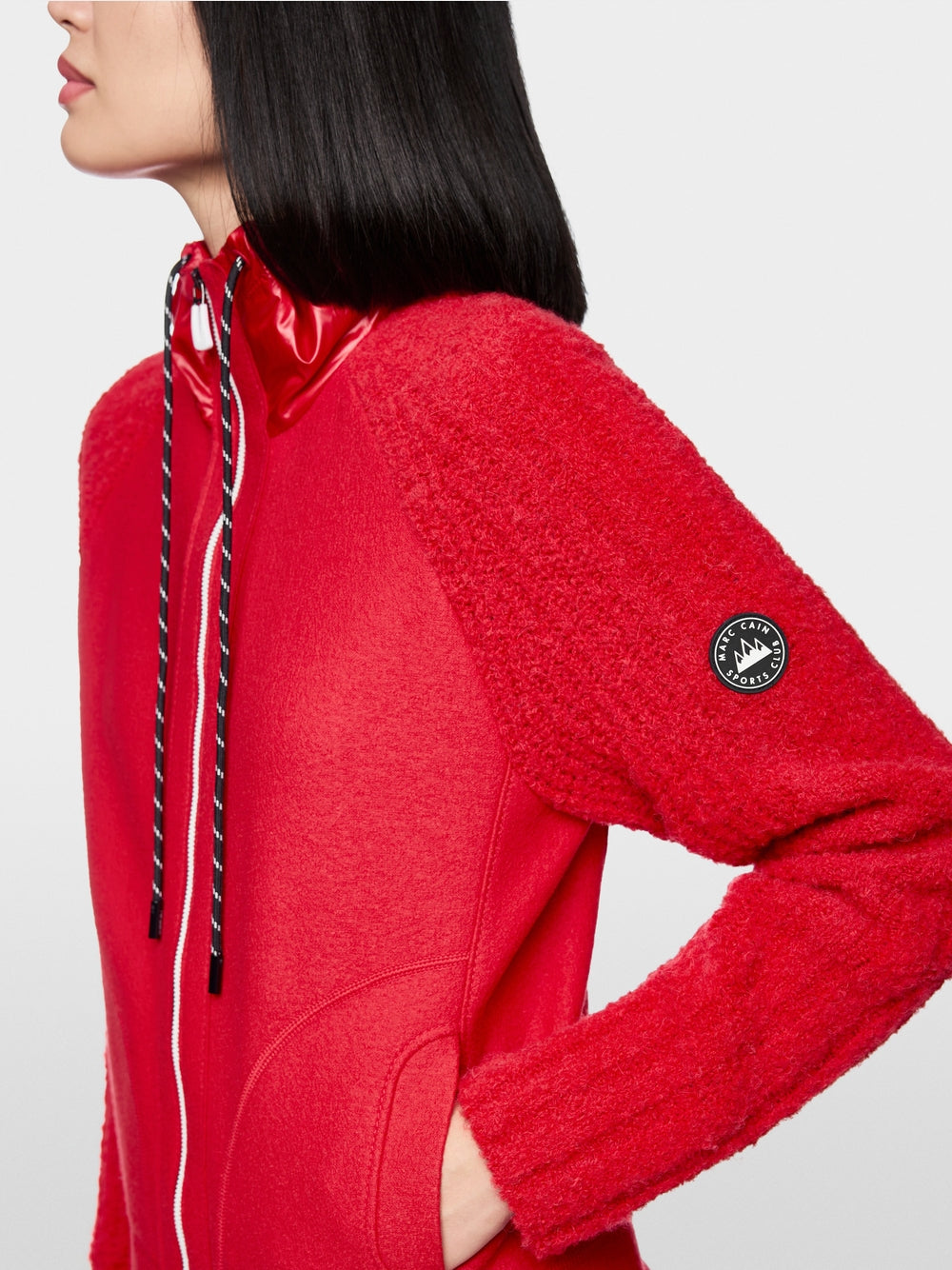 Knitted in Germany cardigan with hood