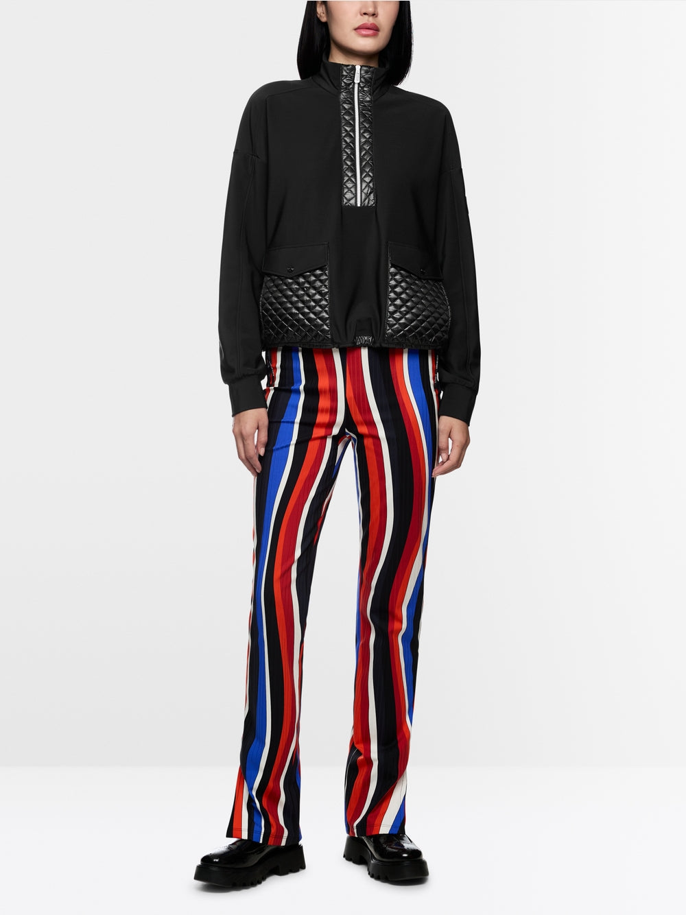 Sweater with stand-up neck and pockets