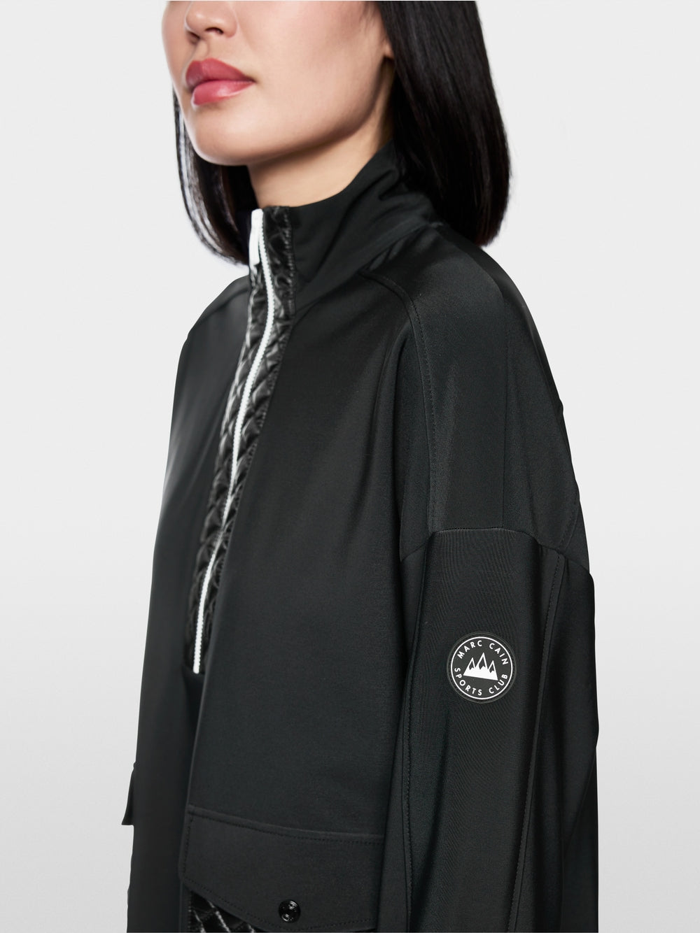 Sweater with stand-up neck and pockets