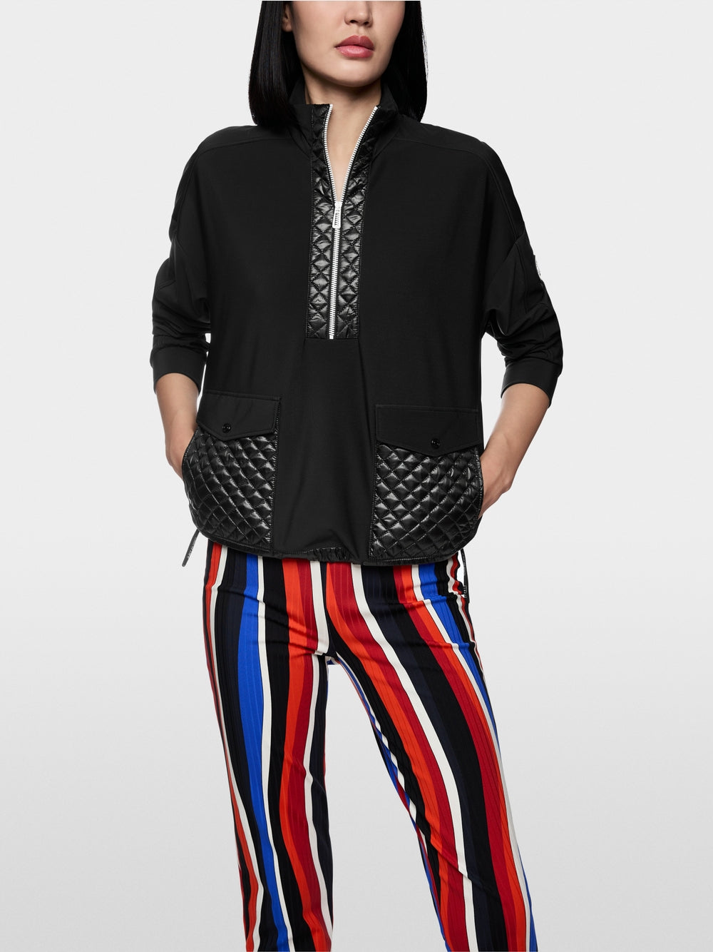 Sweater with stand-up neck and pockets