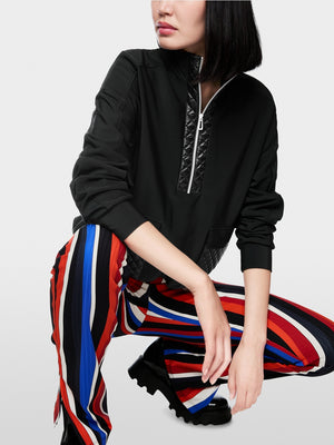 Sweater with stand-up neck and pockets