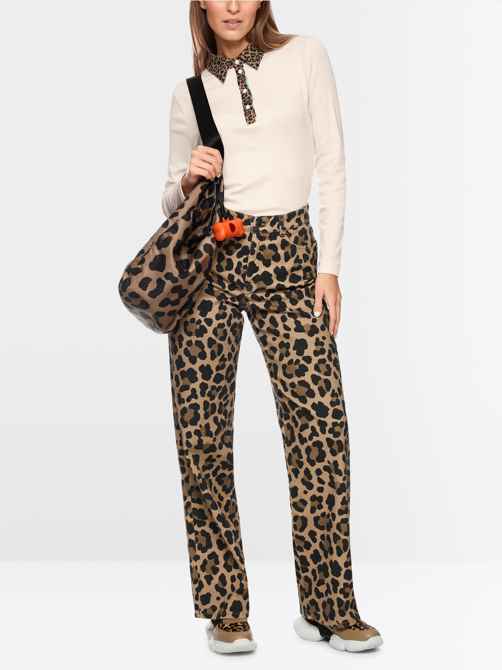 Plain polo shirt with leopard details